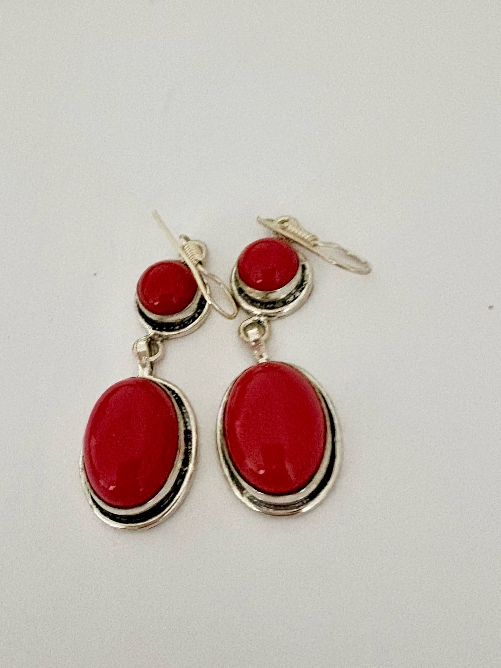Beautiful 2 stone, 925 marked, dangling Coral earrings.